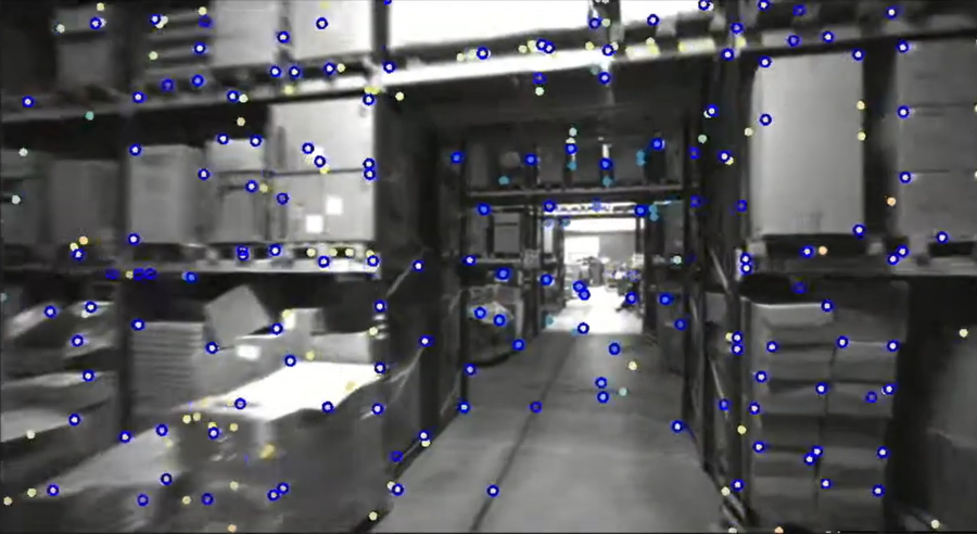SLAM in action - Dots on a warehouse image
